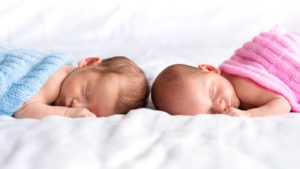 boy and girl twin babies sleeping